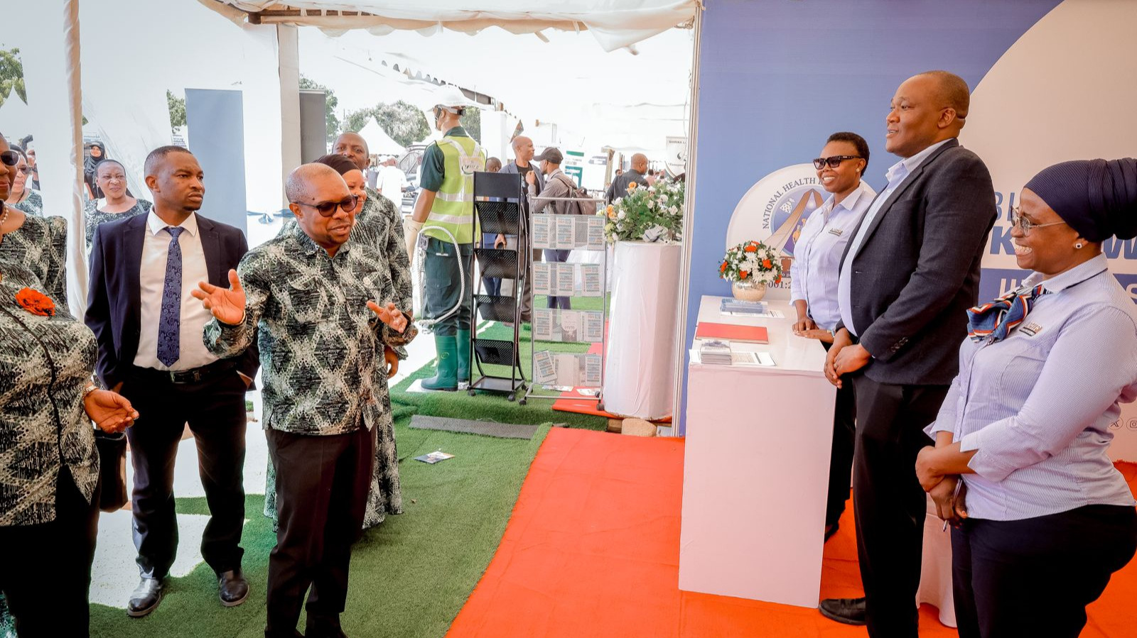 WAZIRI AFURAHIA UWEPO WA NHIF MAONESHO OSHA